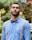 man in white dress shirt and blue necktie