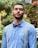 man in white dress shirt and blue necktie