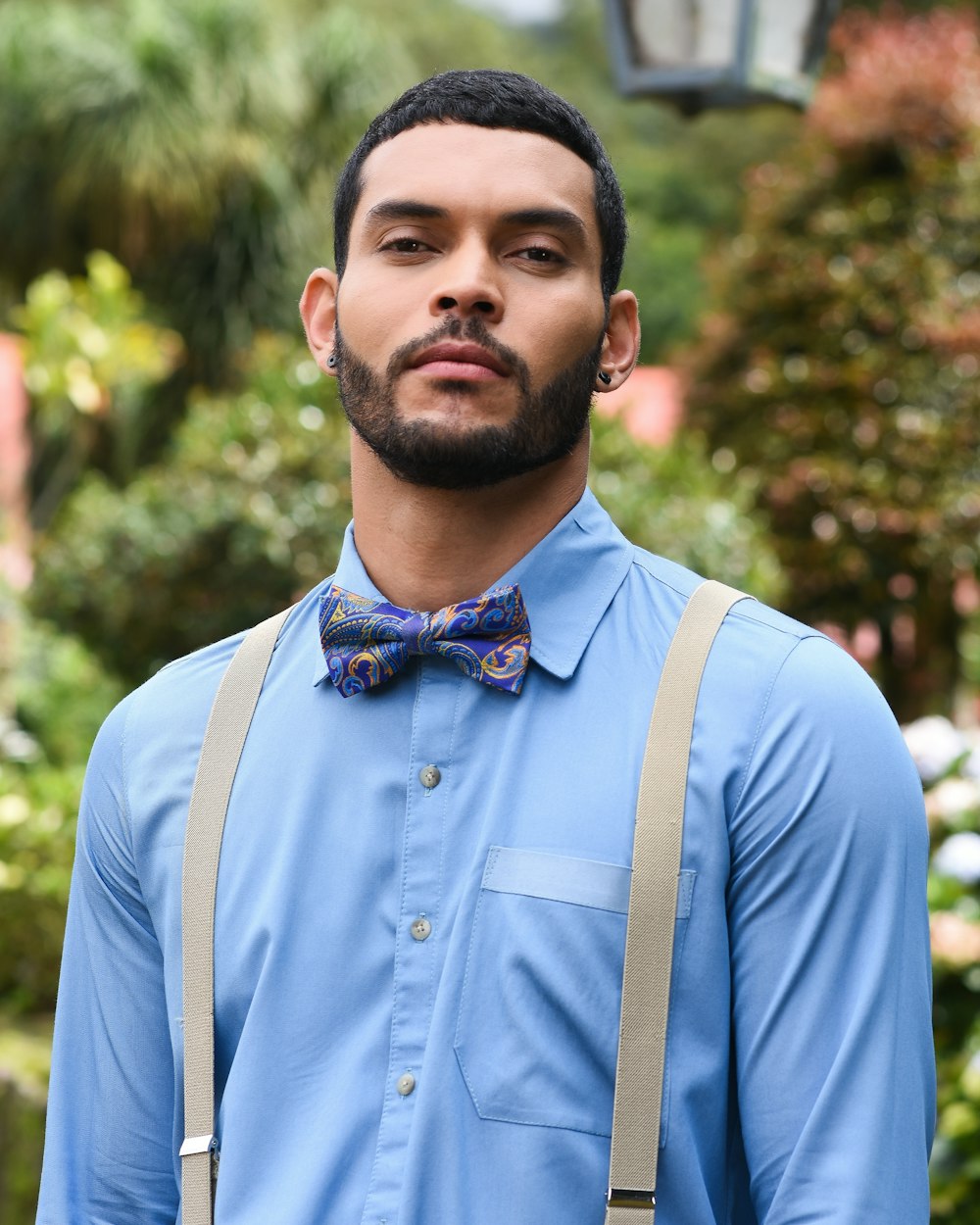 man in white dress shirt and blue necktie