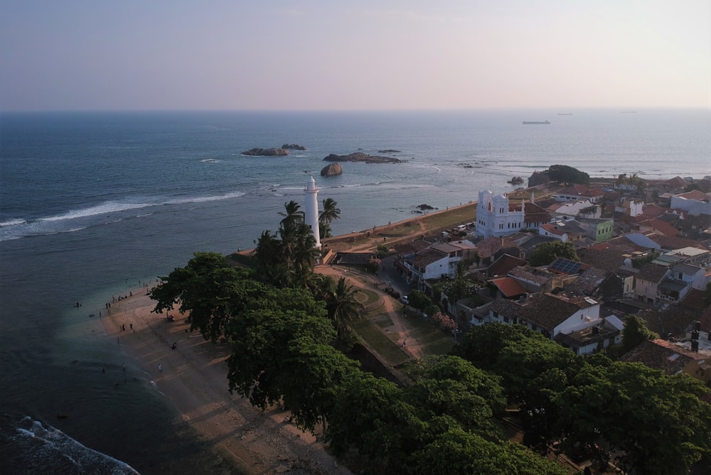 aerial view of city near sea during daytime