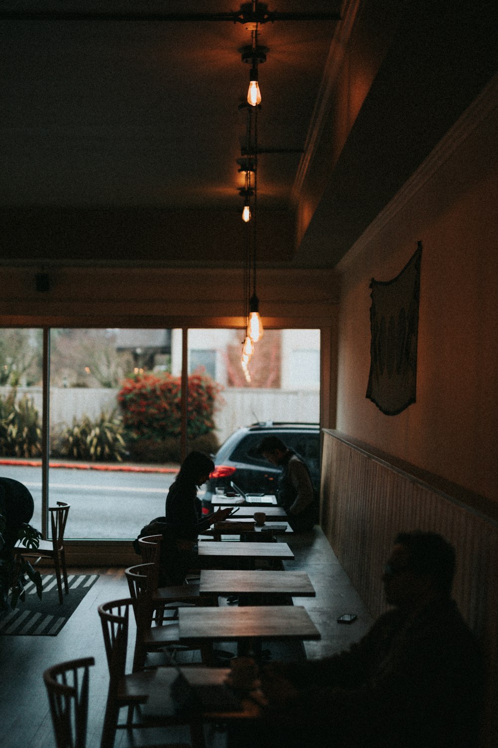 black car parked near window