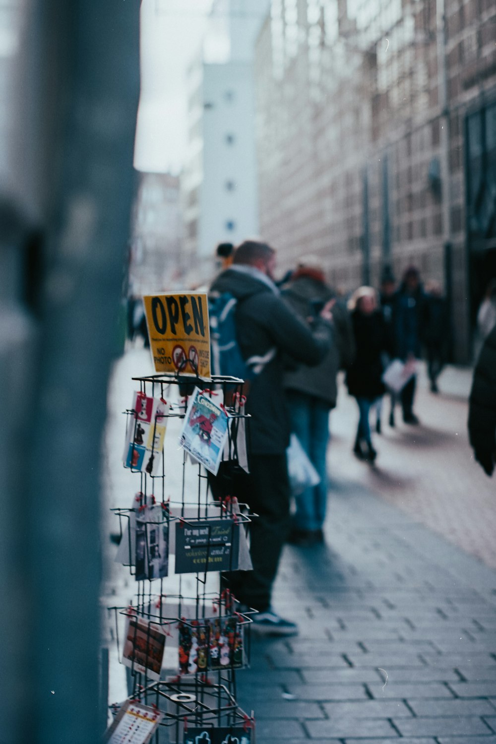 people walking on street with shopping carts