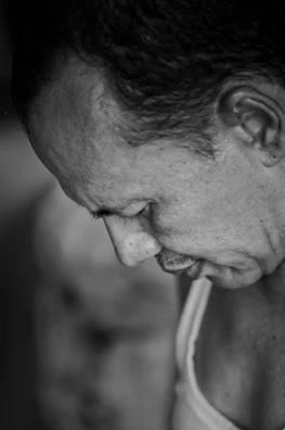 A black-and-white portrait capturing the thoughtful expression of a seasoned performer.