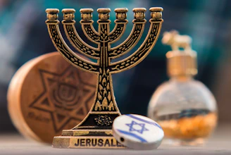gold and black trophy on brown wooden table