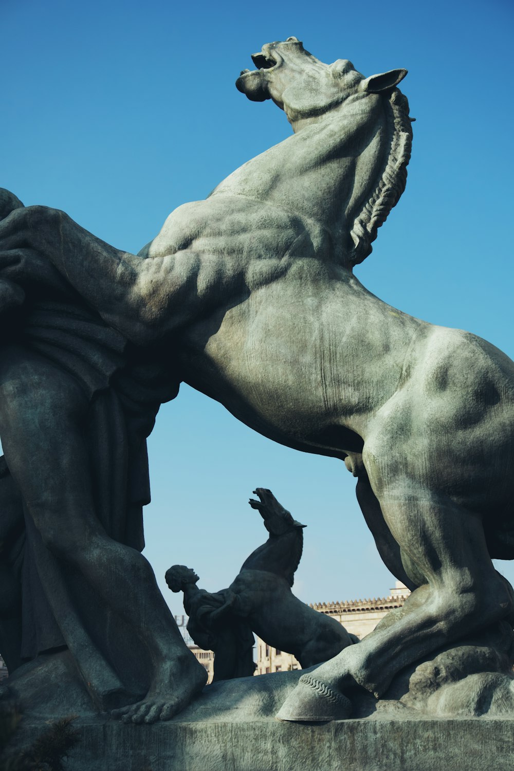 man riding horse statue during daytime