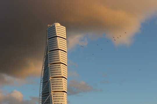 white high rise building under blue sky during daytime in Scaniaparken Sweden