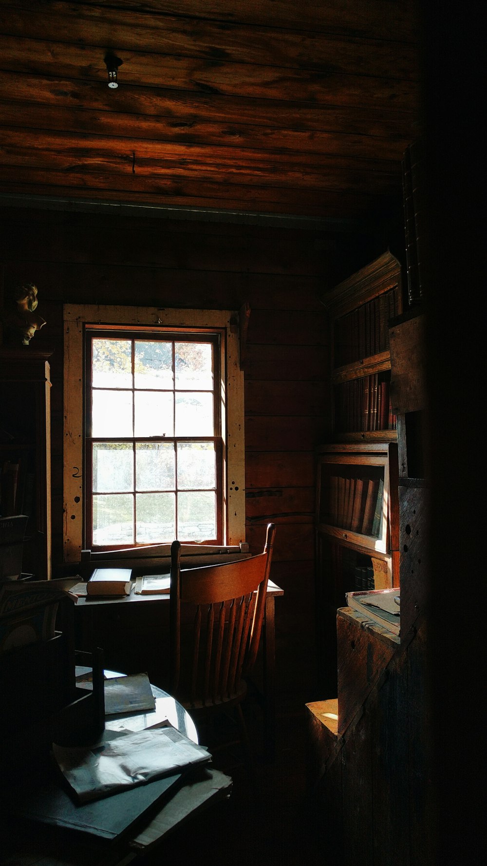 brown wooden chair beside brown wooden table