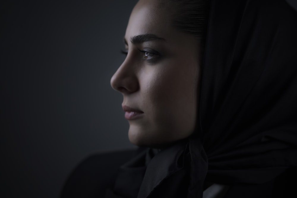 woman in black and white hijab