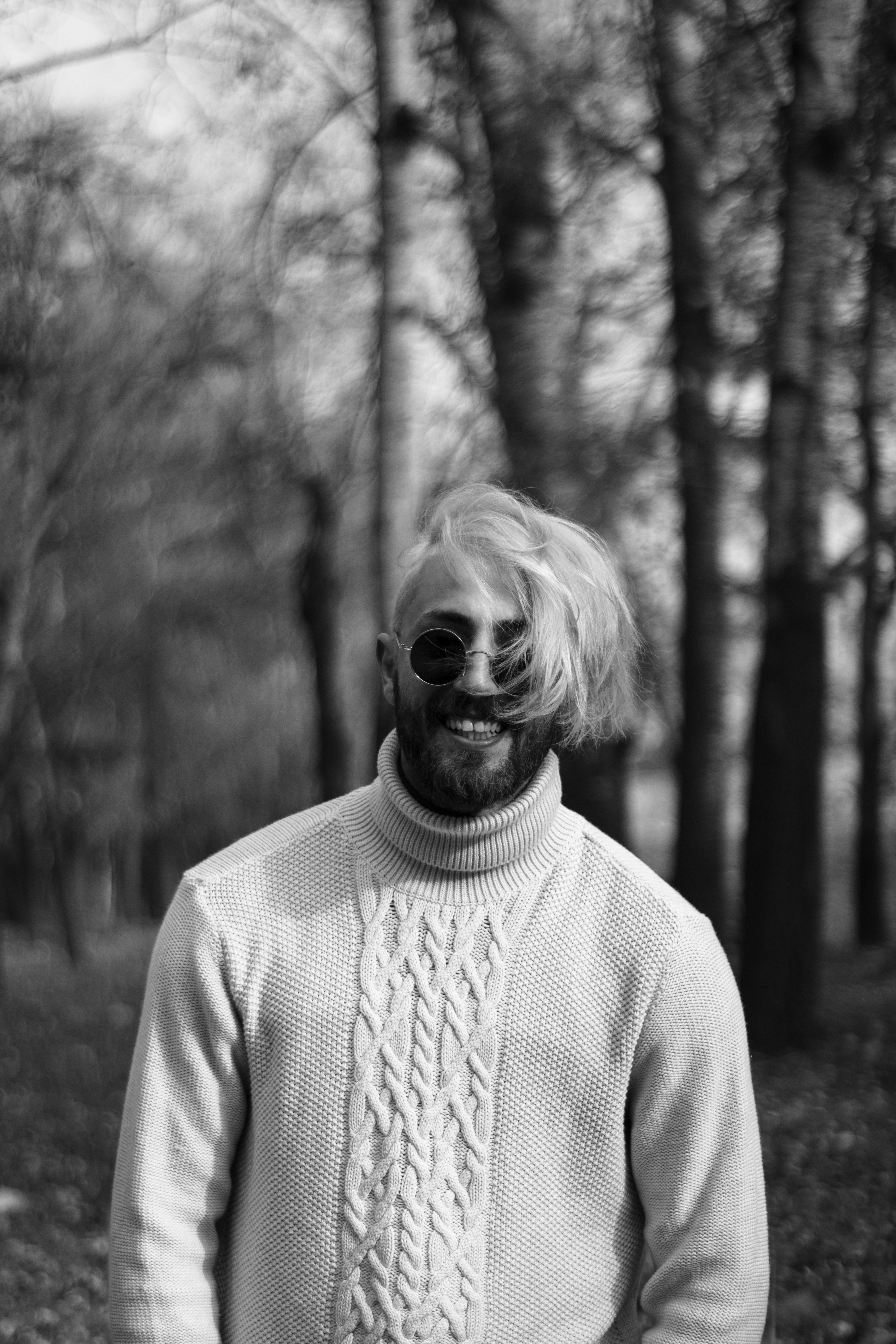 grayscale photo of woman in sweater