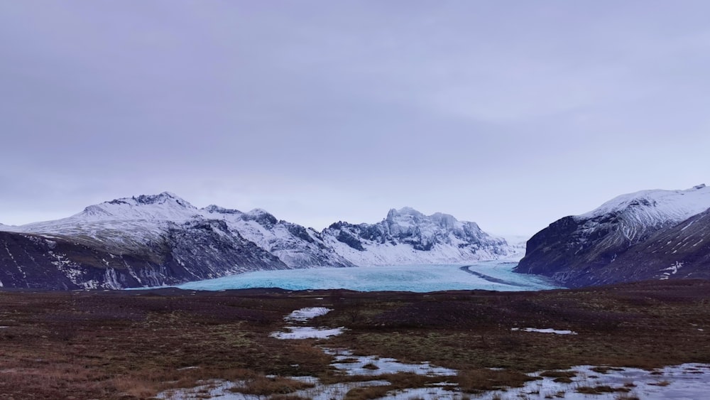 snow covered mountain during daytime