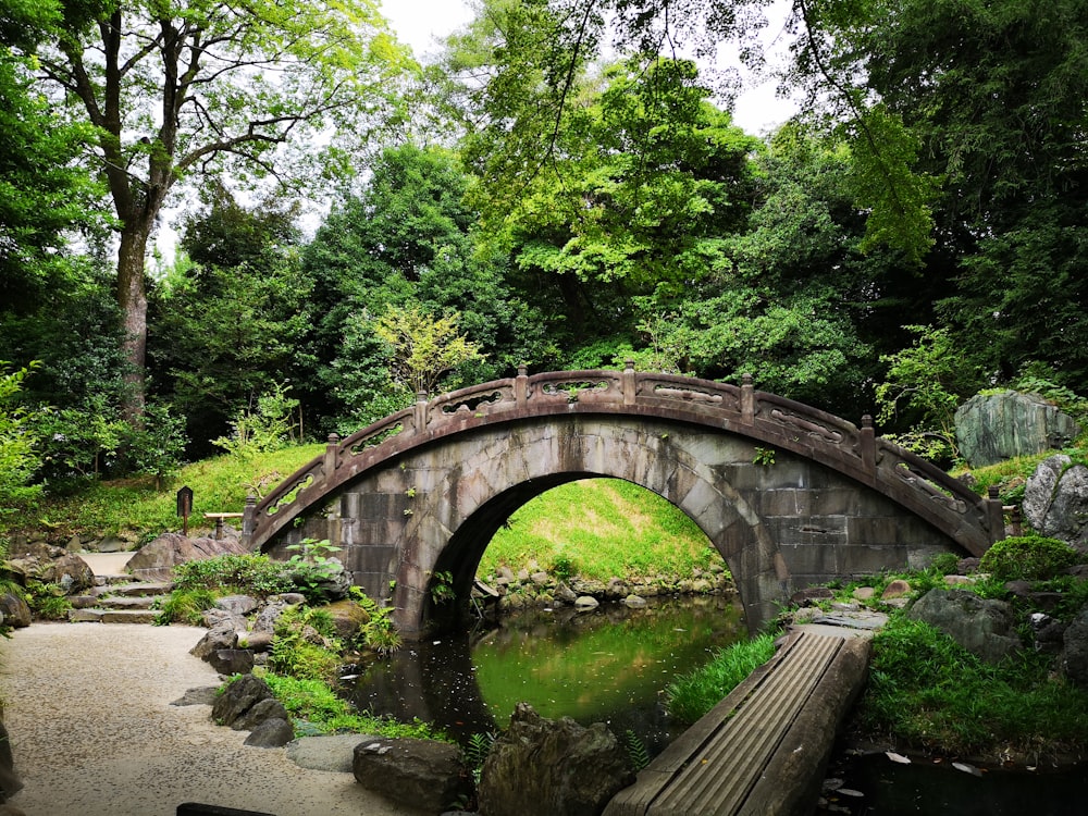 brown wooden bridge over river