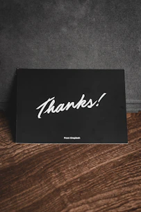 A clean interface displaying a success card with a PDF icon and download options.