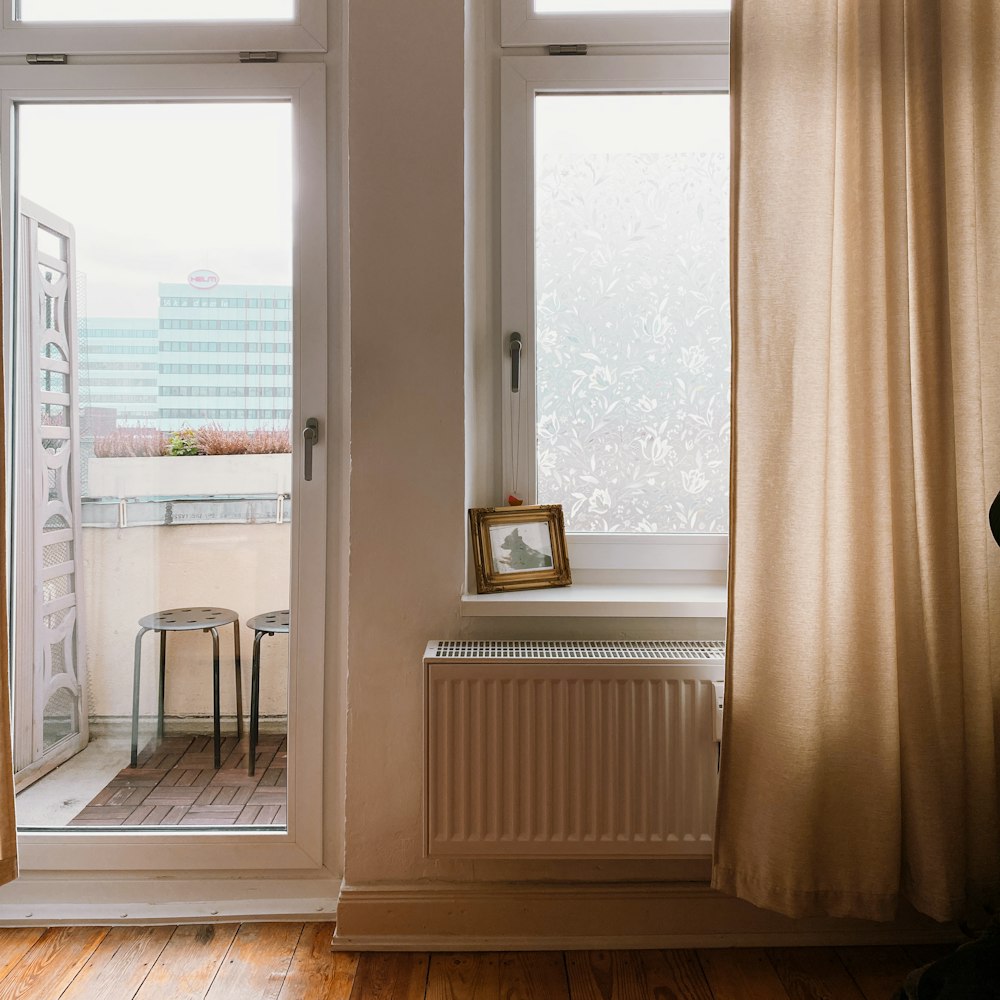white radiator heater near window