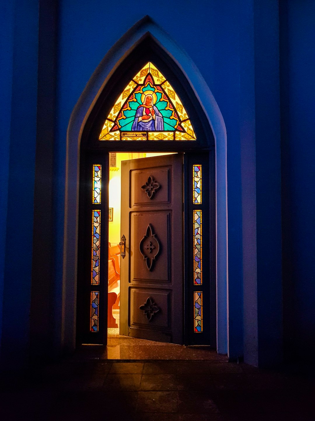 brown wooden door with glass