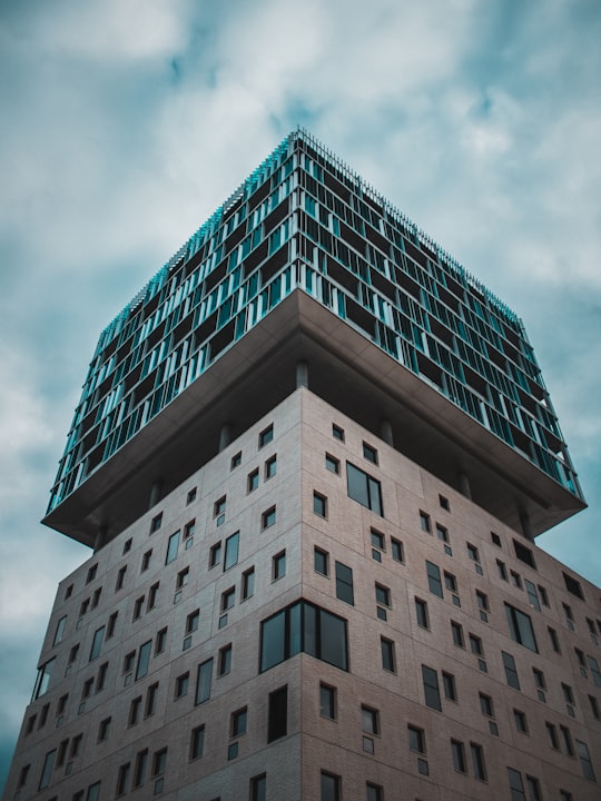 gray concrete building under blue sky during daytime in Bordeaux France