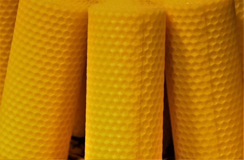 yellow plastic container on brown wooden table