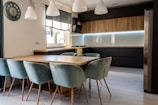 brown wooden table with chairs