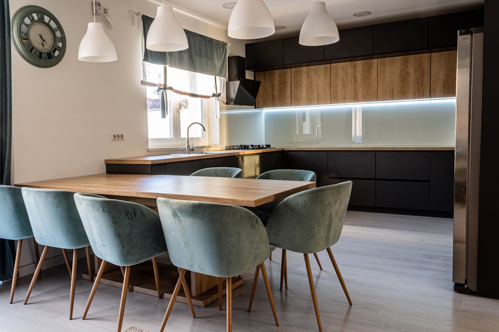 brown wooden table with chairs