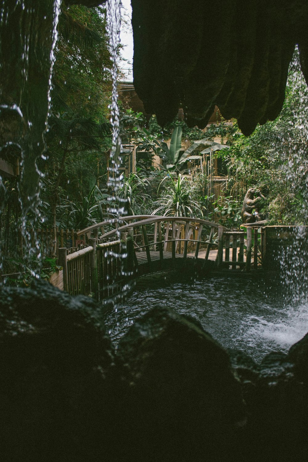 brown wooden bridge over water