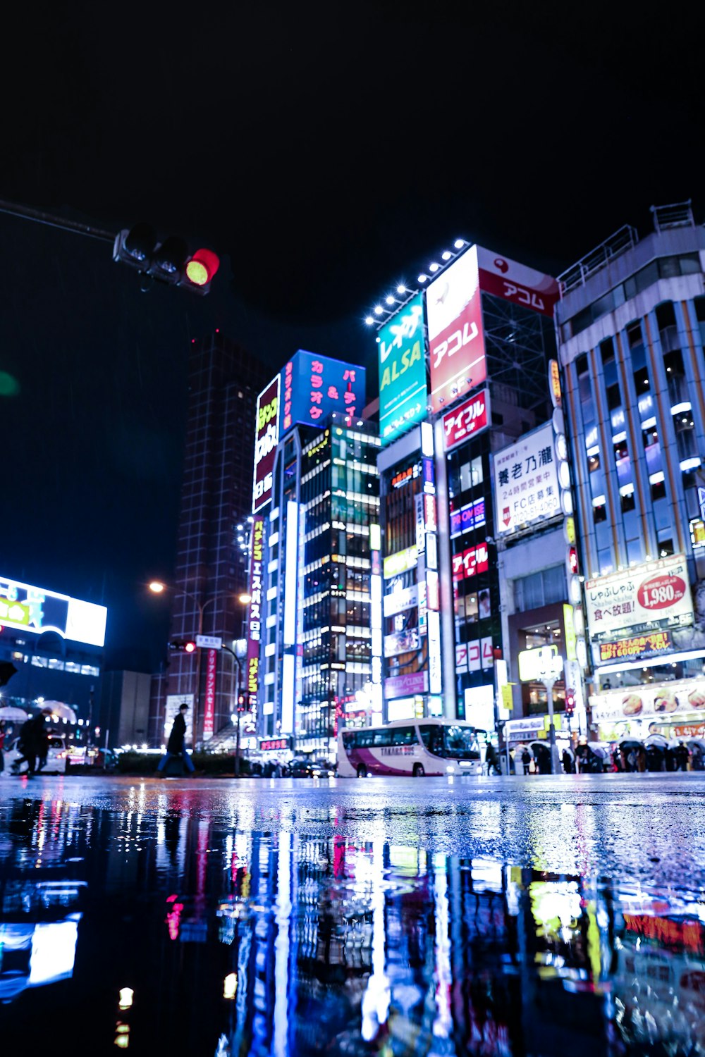 people walking on street during night time