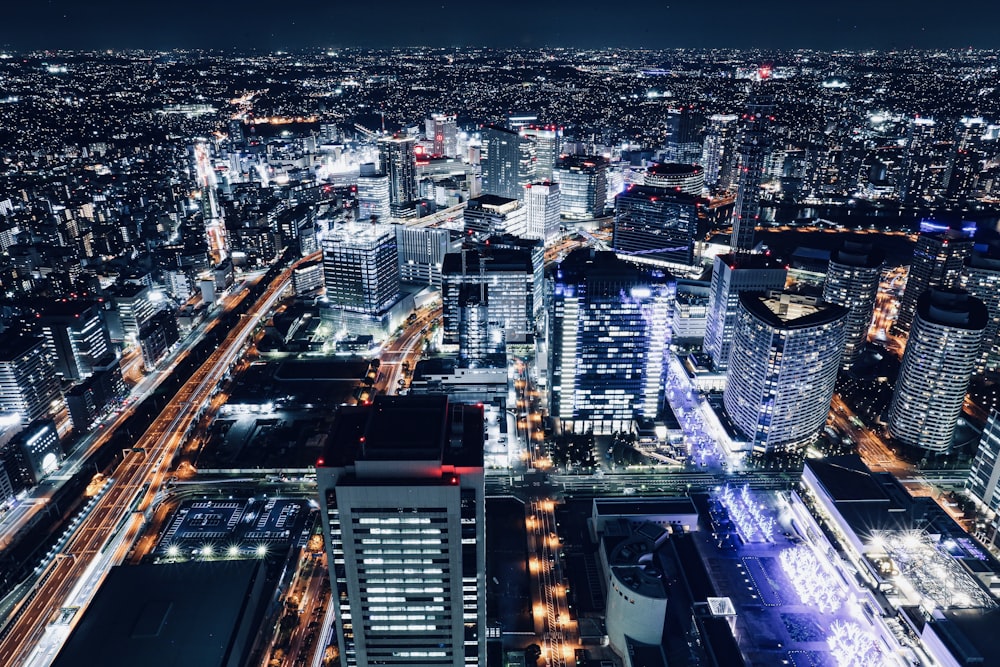 city with high rise buildings during night time