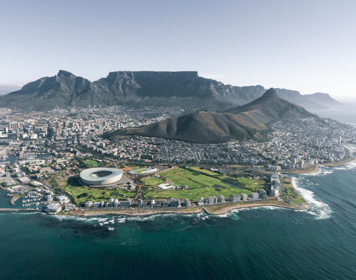 aerial view of city near mountain during daytime