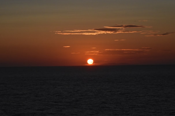 sunset over the sea and clouds
