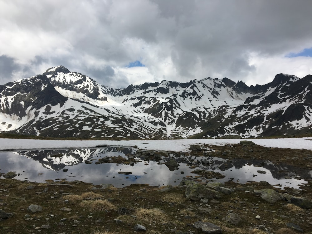 snow covered mountain during daytime