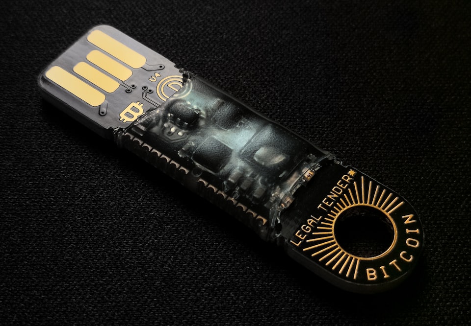 Image of Opendime Bitcoin ledger on black carpet