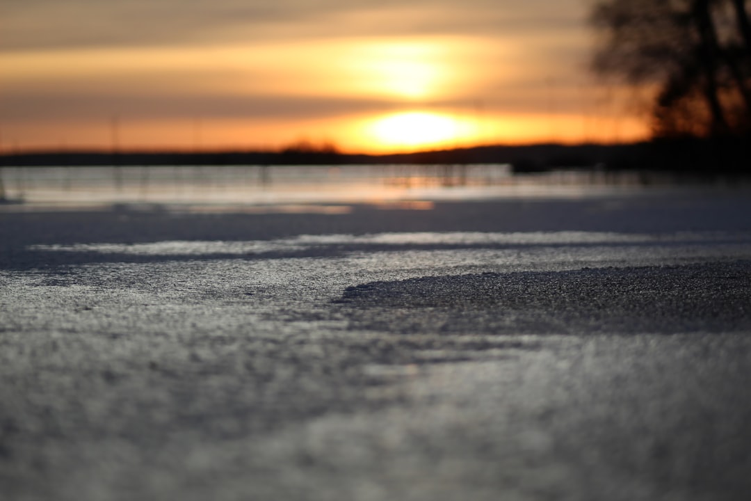 body of water during sunset