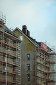brown concrete building under white sky during daytime