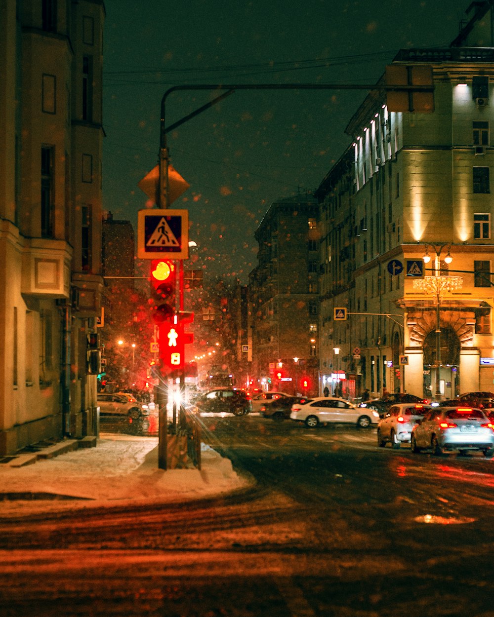 cars parked on side of the road during night time