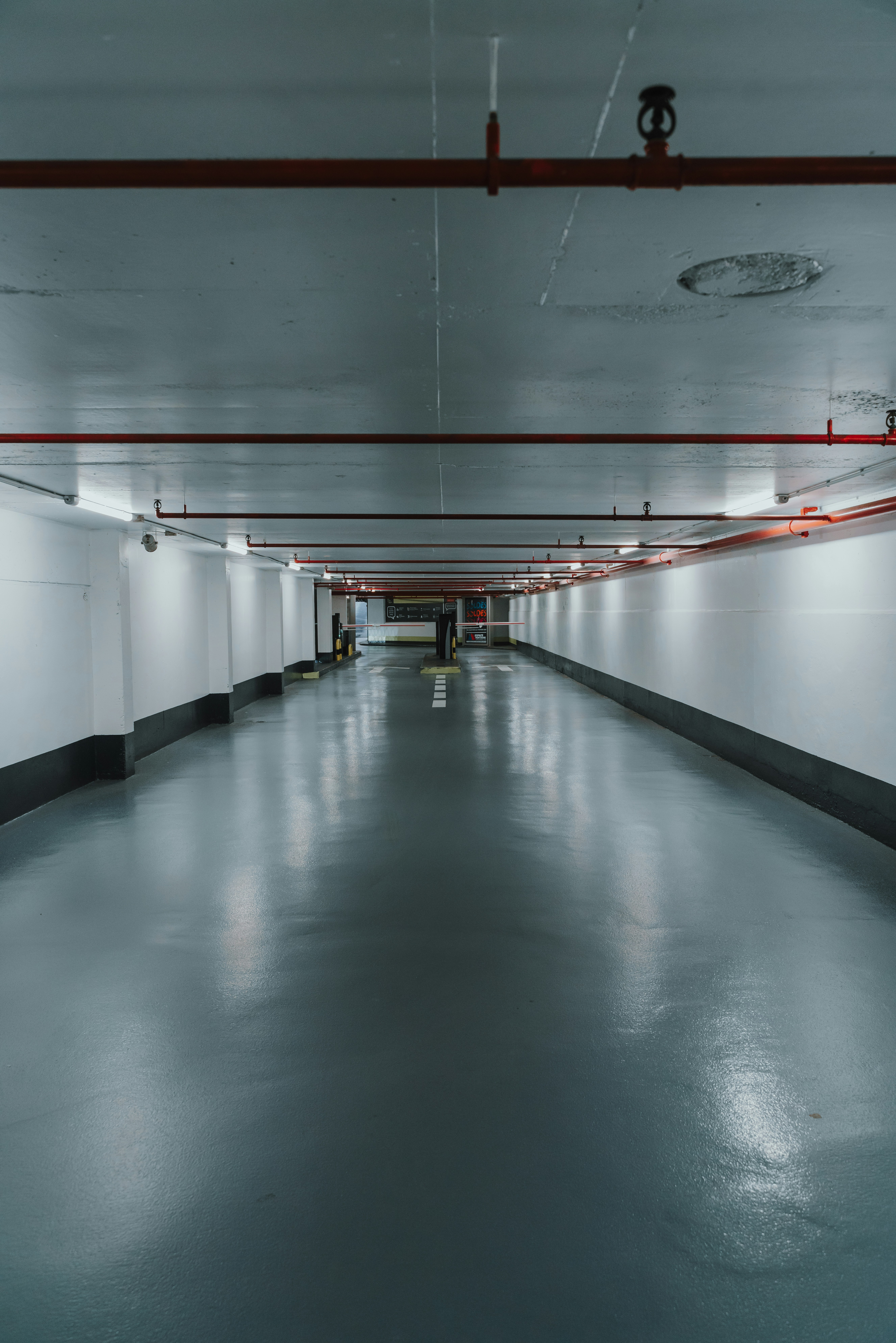 red and white hallway with white wall