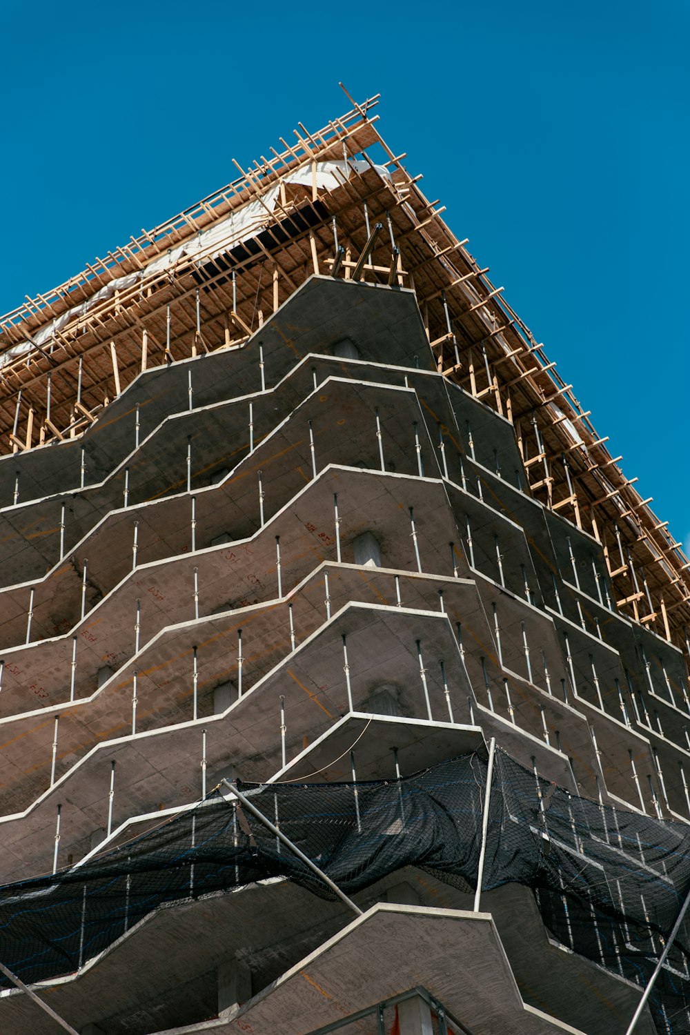 brown concrete building under blue sky during daytime