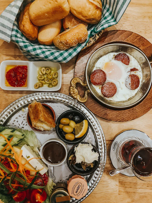 Turkish breakfast served on a round wooden tray