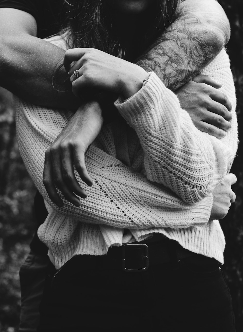 grayscale photo of man in dress shirt and pants