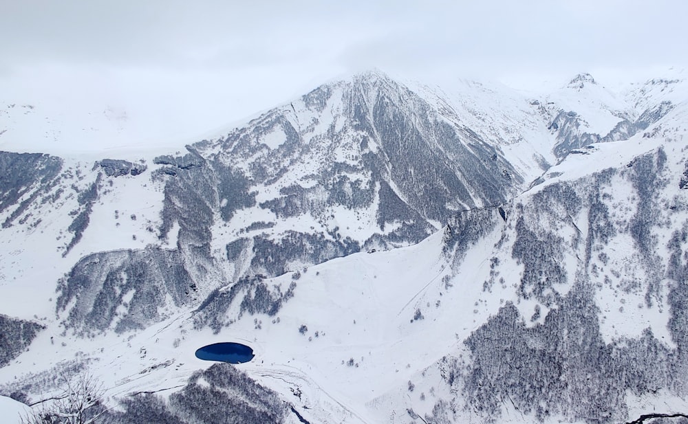 snow covered mountain during daytime