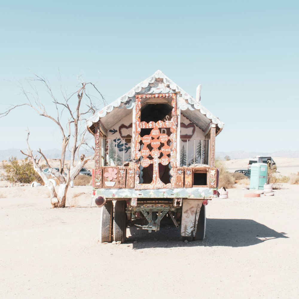 a truck with a structure on the back of it