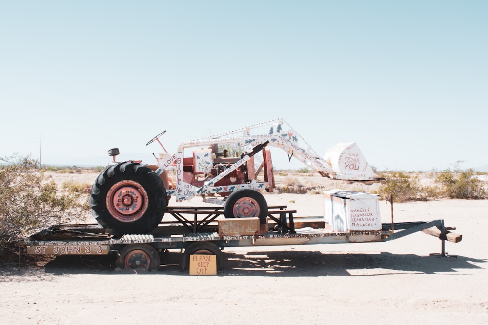 a tractor trailer in the middle of the desert