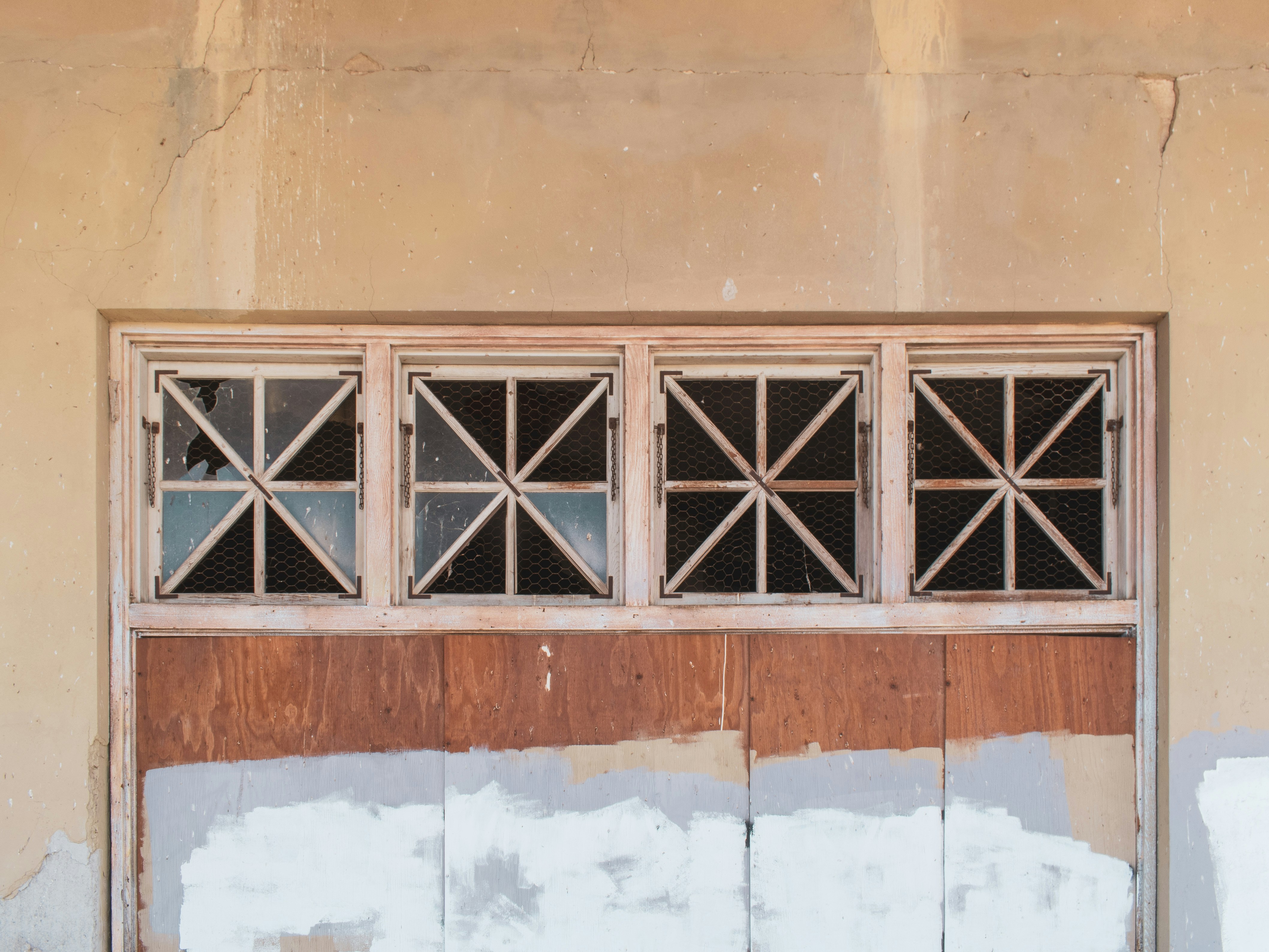 Windows of an abandoned 1930's Bank building in Niland, just outside Slab City