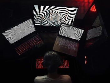 woman in white shirt sitting on chair