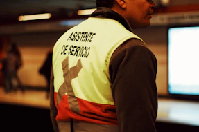 man in white and orange shirt