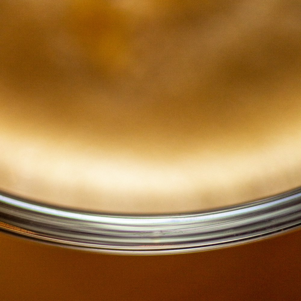 a close up of a metal object with a blurry background