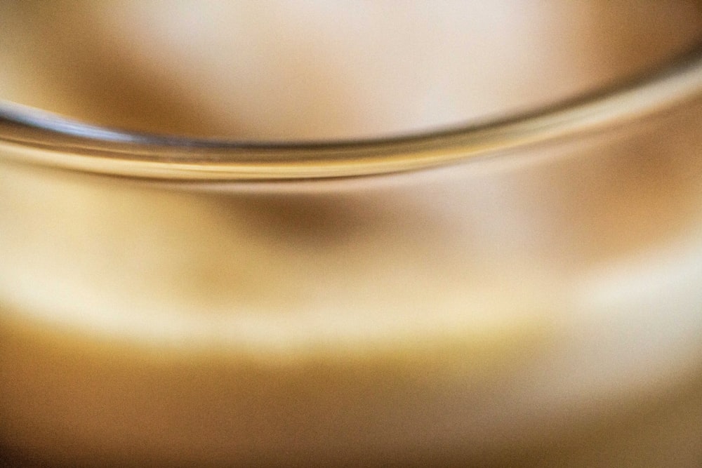 a close up of a metal object with a blurry background