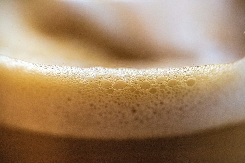 a close up of a glass of beer