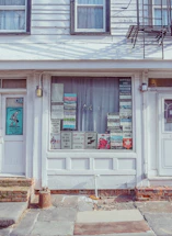 A friendly shop front of Pro-Craft Signs with colorful custom signs displayed.