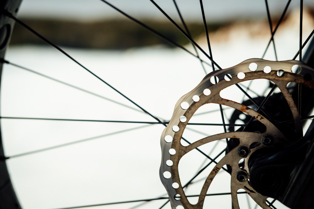 a close up of the spokes of a bicycle