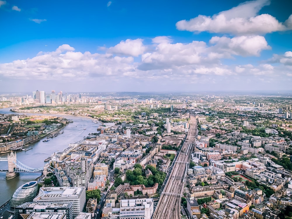 an aerial view of a city and a river