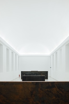 Interior space showcasing structural details and elegant modern finishes in monochrome tones.