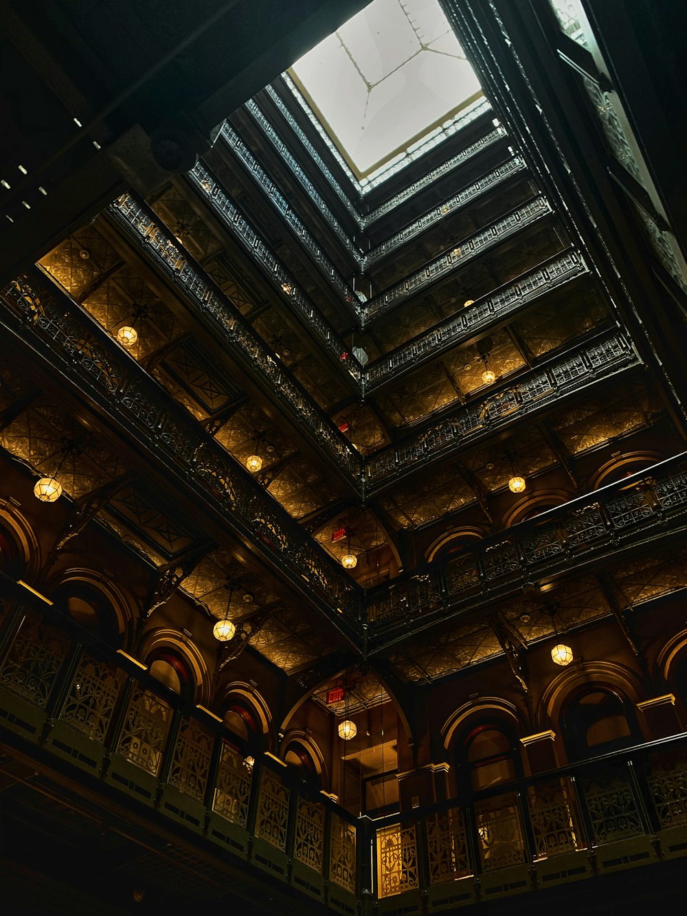 the ceiling of a building with a skylight above it